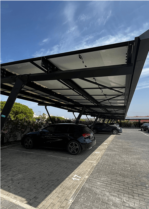 Parking area with a solar carport canopy providing shade to parked cars